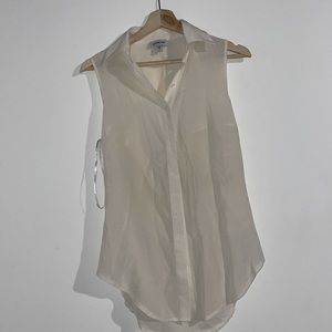 Bebe cream, sleeveless, open back blouse